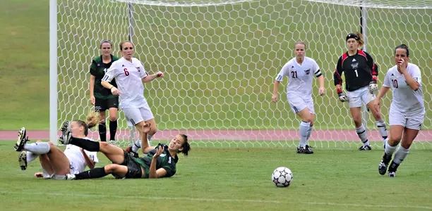 Trojans Fall in Home Opener Image