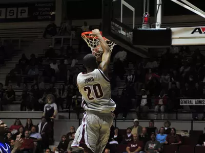 Trojans Hold On for 68-63 Win Image