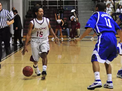 Trojans Fall to Flyers, 87-70 Image