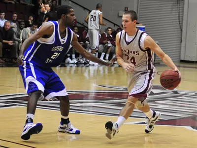Trojans Dominate Demons, 100-63 Image