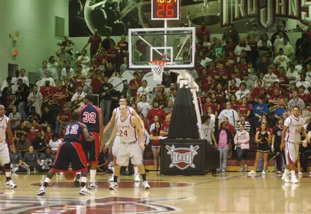 Trojans Run Away From Owls Image