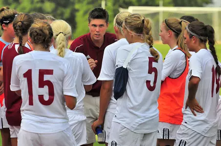 Trojans Battle Through OT for Tie Image