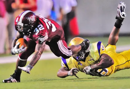 Records Fall as Trojans Roll, 65-0 Image