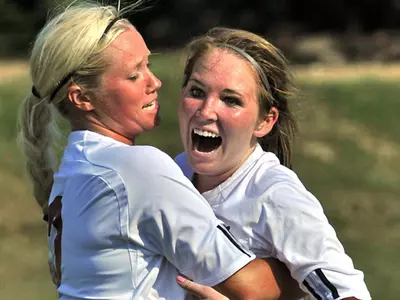 Trojans Shatter Records in Victory Image