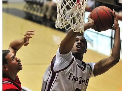Trojans Topple William Carey Image