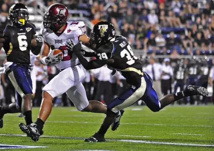 Trojans Topple FIU Image