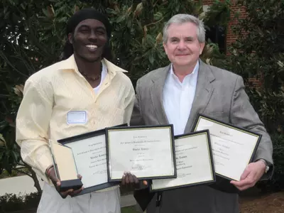 Leonce Wins Awards off the Track Image