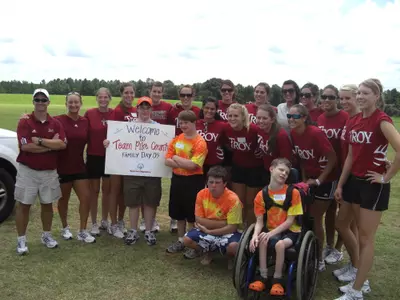 Trojans Mix With Pike County's Finest Image