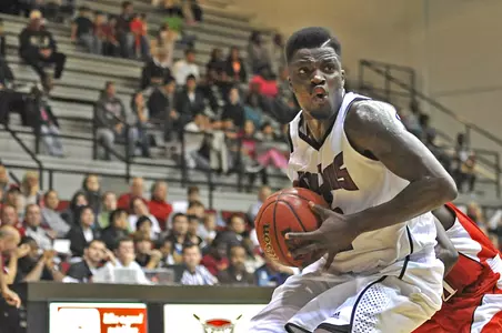 Senior Vernon Taylor drives against West Alabama