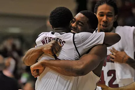 Mo Weathers and Steven Cunningham Embrace following Troy's 89-81 win over North Texas on 1/15/11.