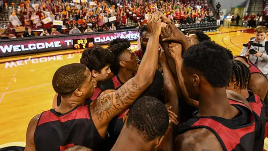 MBB Huddle Trojan Madness
