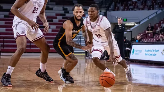 Duke Deen drives past the defender