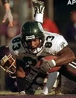 Adrian Burnette dives<br>for extra yardage during<br>the second quarter<br>against East Carolina.