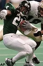 Gee Reshard is brought down by an Alabama-Birmingham defender after catching a pass in the second quarter.