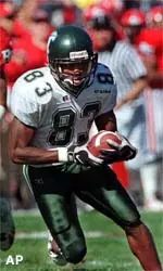 Adrian Burnette caught all<br>three touchdown passes for the<br>Green Wave, finishing with<br>nine catches and 136 yards.