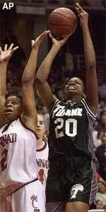 Janell Burse contributes 17.8 points and 10.5 rebounds per contest.