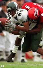 Tulane wide receiver Kerwin Cook stretches for extra yards after one of his eight catches against the ULL defense.