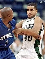 Marlo Miles gets tangled up with Memphis' Keiron Shine during the first half on Wednesday.