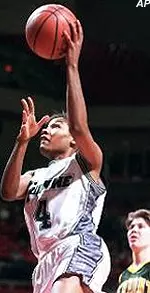 Tulane's Grace Daley shoots over Vermont's Libby Smith for two of her 30 points in Saturday night's NCAA first round game.