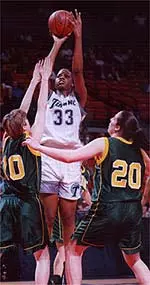Janell Burse led the <br> Green Wave attack with <br> 23 points and 13 rebounds <br> against Charlotte