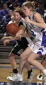 Kelly Nadeau tries to steal the ball from Drake's Jayme Anderson during the second half.