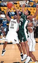 George Brown blocks Southern Miss center Mel Cauthen in Tulane's 78-63 loss Saturday.