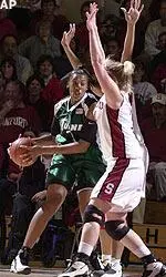 Teana McKiver draws the defense of Stanford's T'Nae Thiel and Bethany Doniphan while driving to the lane in the first half.