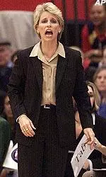 Head coach Lisa Stockton directs her team in the first half against Cincinnati.