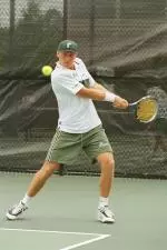 Michael Kogan cruised to victory at No. 1 singles, but it was not enough as the Green Wave fell to USF.