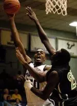Sophomore Quincy Davis led the Green Wave with 13 points and four blocks on Saturday (File photo by Ned Dishman).