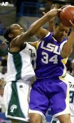 Louisiana State University forward Wendlyn Jones and Tymeka Moore battle for the rebound.