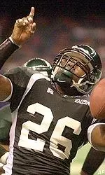Running back Mewelde Moore celebrates after scoring in fourth-quarter action.