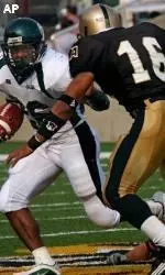 Mewelde Moore looks to shake Army linebacker Greg Washington.