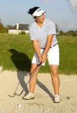 Senior Liliana Alvarez notched the Green Wave's only point in a loss to USC and leads her second-round match through 14 holes.