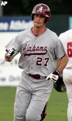 Alabama's Morrow Thomley (27) runs past Louisiana-Lafayette's Justin Merendino (6) after hitting a home run in the fourth inning in the New Orleans Regional of the NCAA college baseball tournament Sunday June 5, 2005. Thomley hit the home run with two men on base. (AP Photo/Bill Haber)