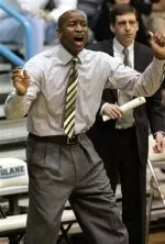 Tulane coach Dave Dickerson encourages his team in a 50-47 victory over Southern Miss on Wednesday.