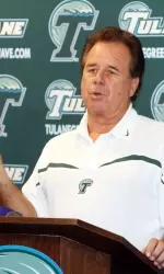 Head Coach Bob Toledo addresses the media
