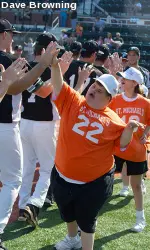 Students of St. Michael's Special School celebrate with members of the Green Wave baseball club after the annual fall softball game.