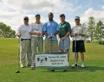 Former Tulane football star Matt Forte, center, joins a team of golfers at the Tulane Classic. The team, which took first place, also includes, from left, Rick Kuebel, Billy Gardner, Joe Agular and Bill Brennan. Forte now plays for the Chicago Bears. (Photo by Sally Asher)