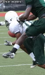 Junior cornerback Ryan Travis picks off a pass during Thursday's practice at the Westfeldt Practice Facility.