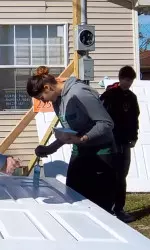 Junior Volleyball Player Izabela Grot Helped Out the St. Bernard Project on January 18