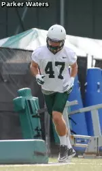 TU linebacker Cameron DeJean hustles through drills during the Wave's second day of fall practice on Tuesday.