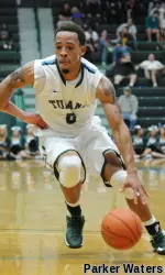Louis Dabney drives to the basket.