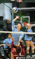 Senior Cori Martone soars high for one of her eight kills against Rider