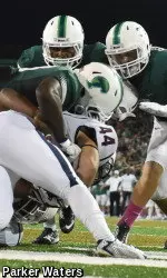 Senior defensive end Tyler Gilbert and the Green Wave defense converge on running back Max DeLorenzo in the endzone for a safety during Tulane's 12-3 win over UConn.