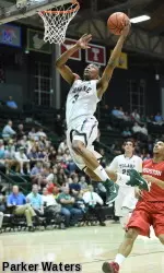 Kajon Mack drives to the basket for two of his six points against Houston.