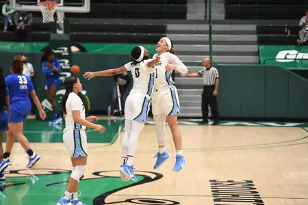 Dynah Jones and Su Clark Chest Bump