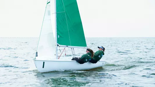 Oakley Cunningham and Hope Breslin sailing for Tulane in SEISA Team Race Championships.