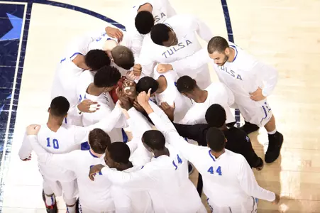 Men's Basketball Team Huddle
