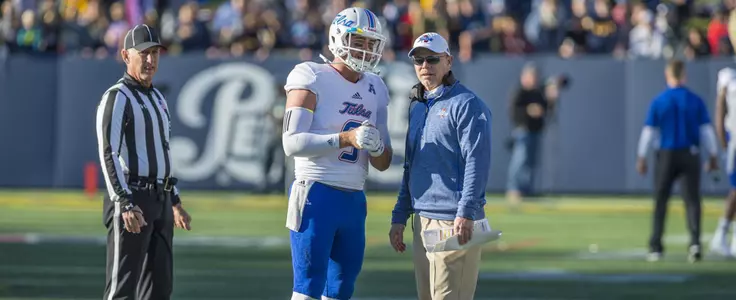 Coach Montgomery and Dane Evans